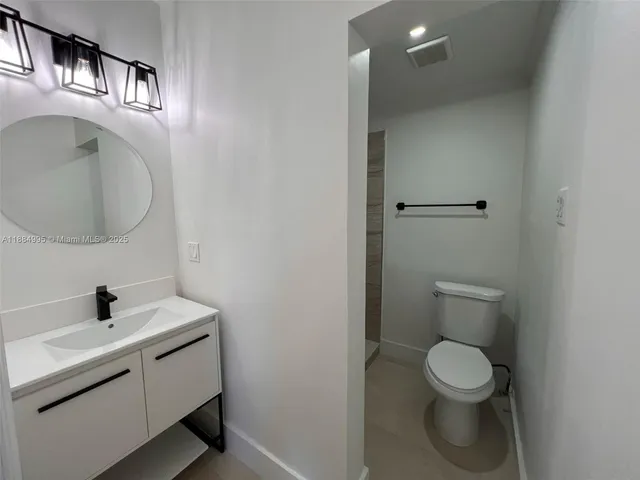 a view of livingroom with hardwood and furniture
