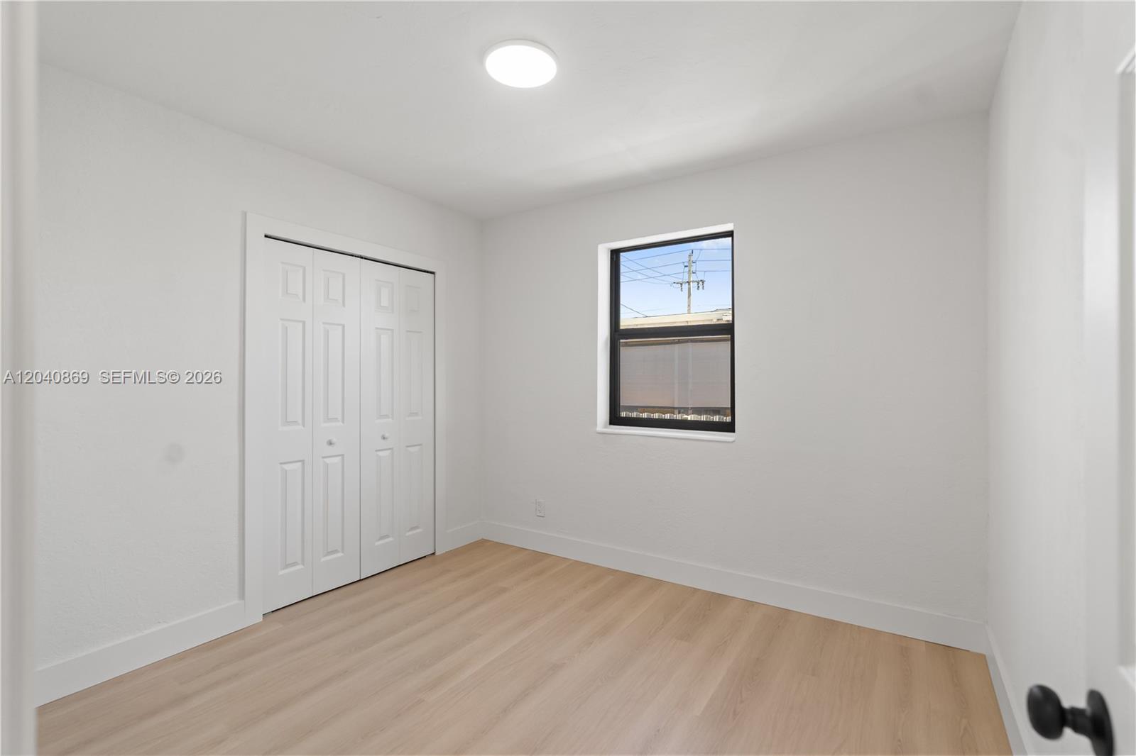 31 West 64th Street Hialeah, FL 33012 - Photo 37 of 49 an empty room with a window