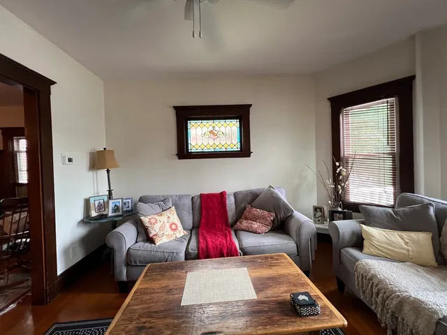 a view of a porch with wooden floor and stairs