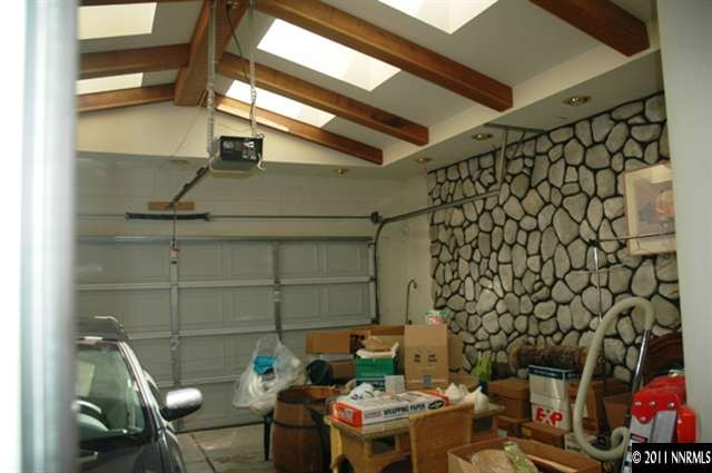 2789 Montego Drive Reno, NV 89523 - Photo 11 of 11 a living room with a couch and a fireplace with wooden floor