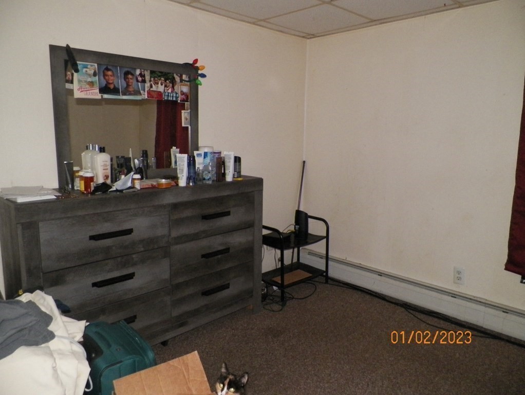 37 Prospect Street Webster, MA 01570 - Photo 11 of 20 a room with a table and a mirror