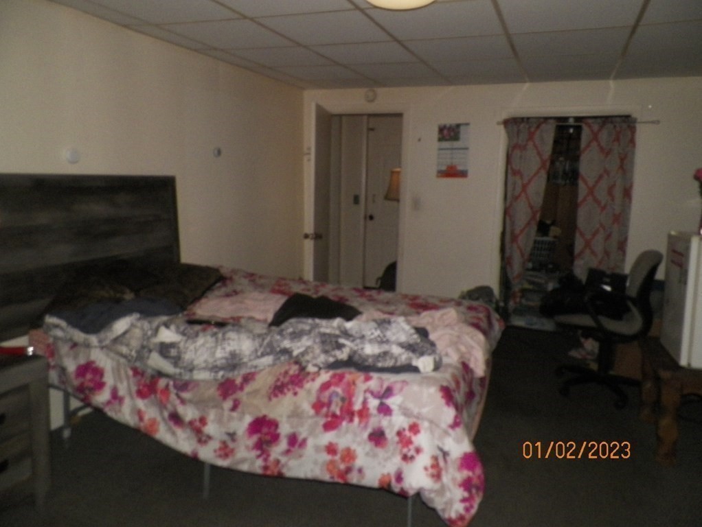 37 Prospect Street Webster, MA 01570 - Photo 13 of 20 a bedroom with a bed and a television