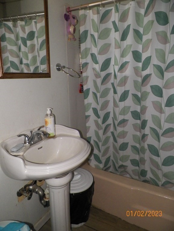 37 Prospect Street Webster, MA 01570 - Photo 17 of 20 a bathroom with a sink and mirror