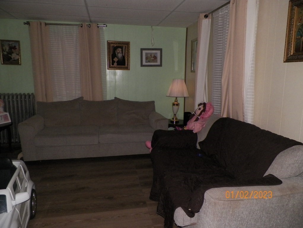 37 Prospect Street Webster, MA 01570 - Photo 8 of 20 a living room with furniture and a window