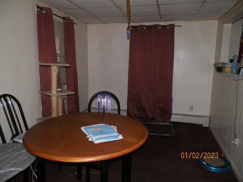 37 Prospect Street Webster, MA 01570 - Photo 9 of 20 a view of a livingroom with furniture and wooden floor