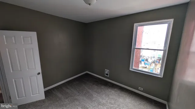 a view of a window in an empty room