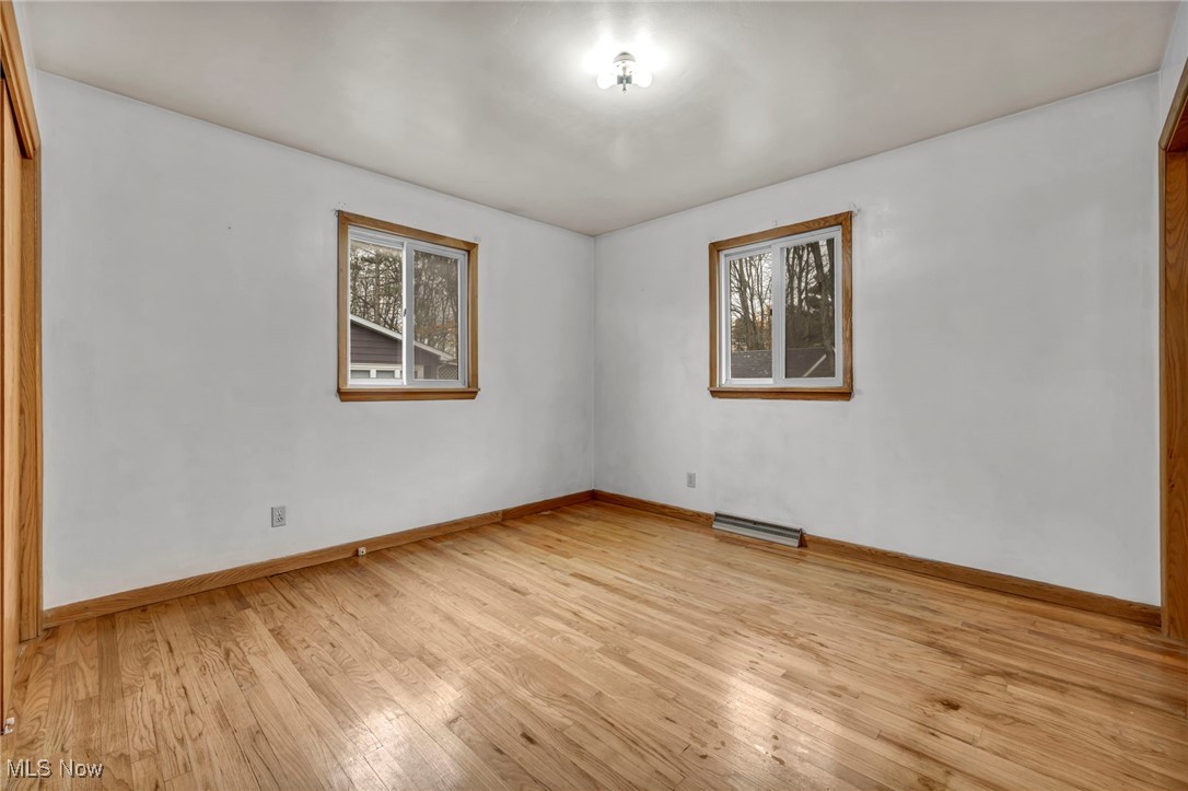 1140 Keefer Road Girard, OH 44420 - Photo 19 of 49 Spare room with light wood finished floors and healthy amount of natural light