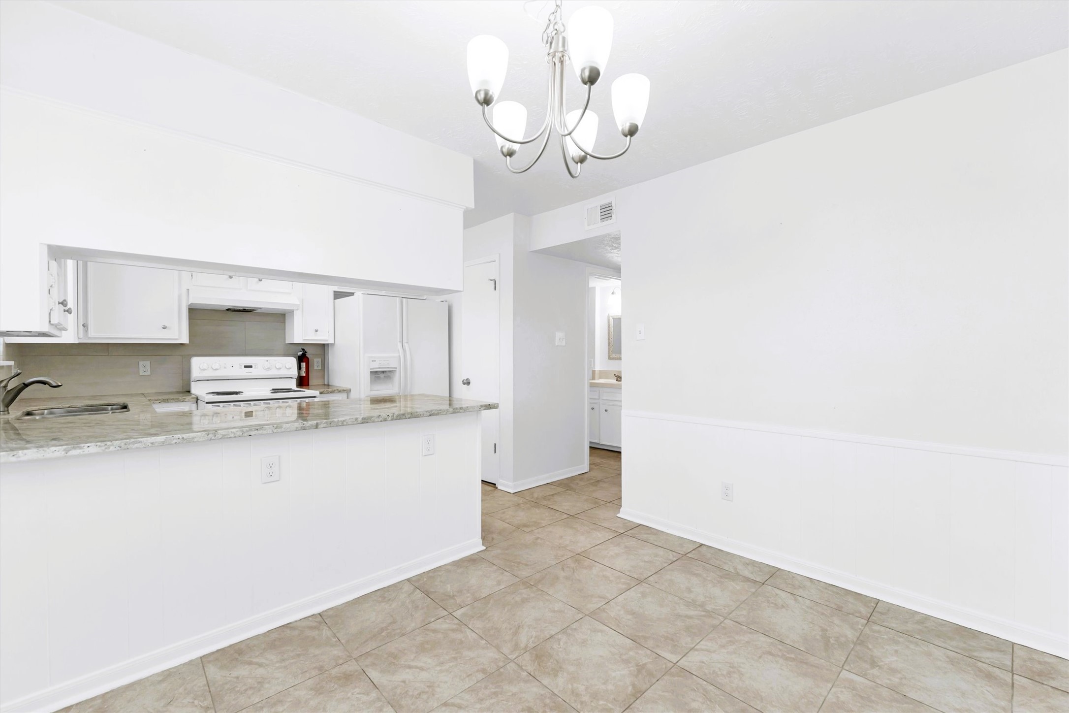 1101 Wilson Drive Rosenberg, TX 77471 - Photo 12 of 38 PERFECT PLACE FOR BAR STOOLS PLUS SPACIOUS PANTRY!