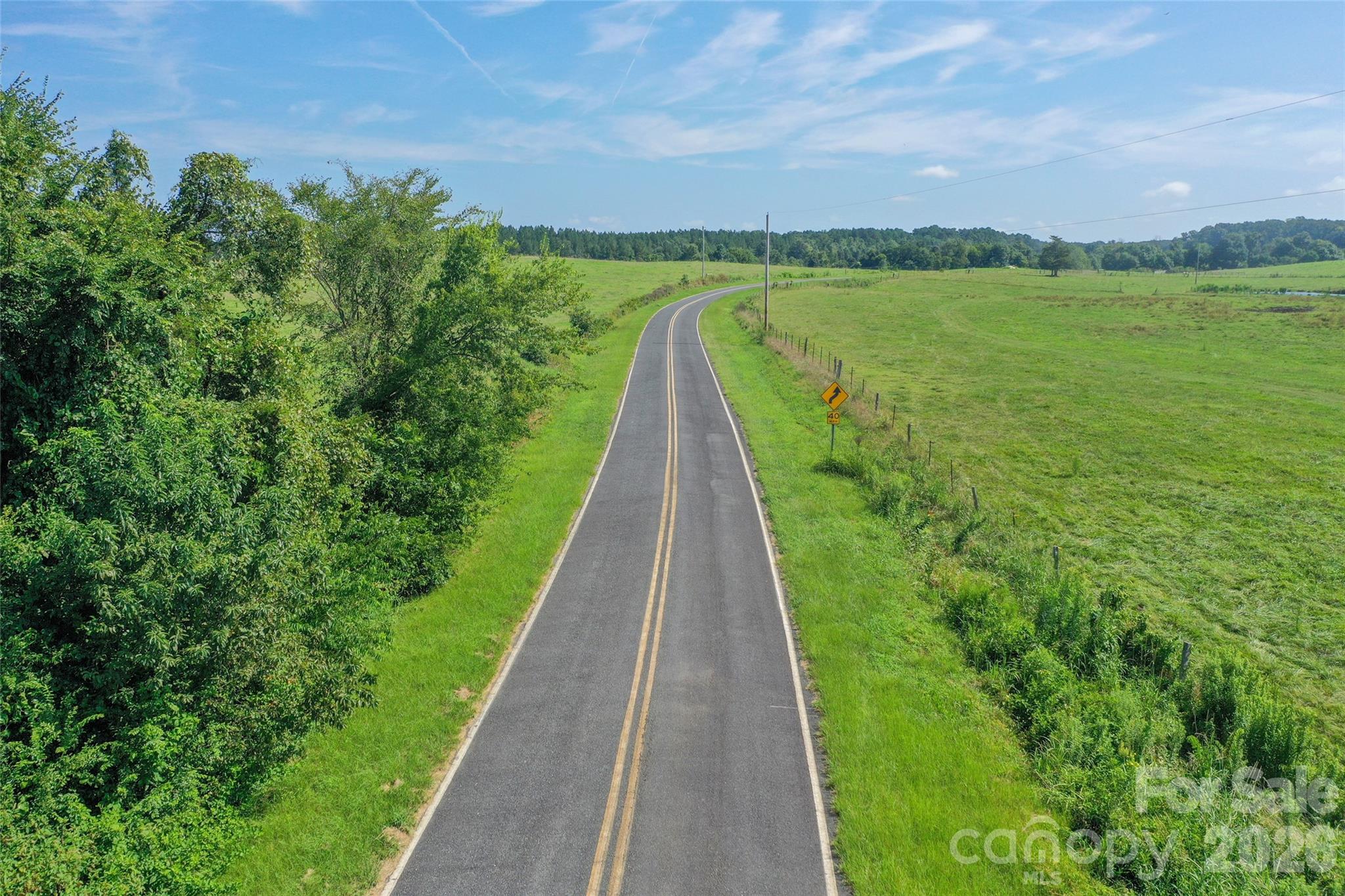 0 Lucy Short Cut Road, Unit A Marshville, NC 28103 - Photo 15 of 23 a view of a garden with lake