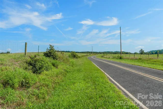 a view of a lake with a big yard