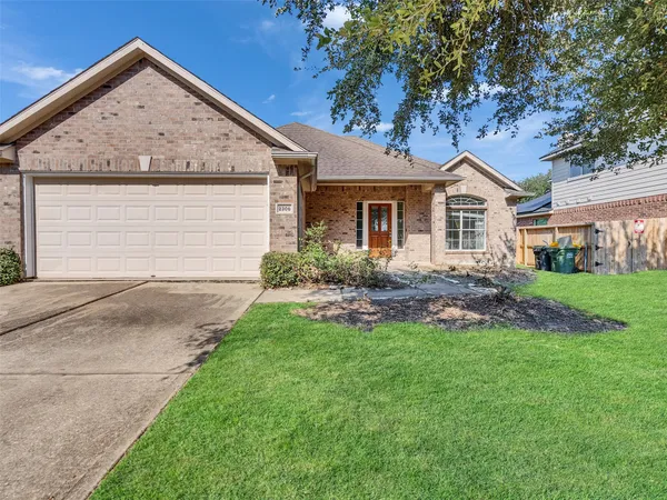 a view of outdoor space yard and front view of a house