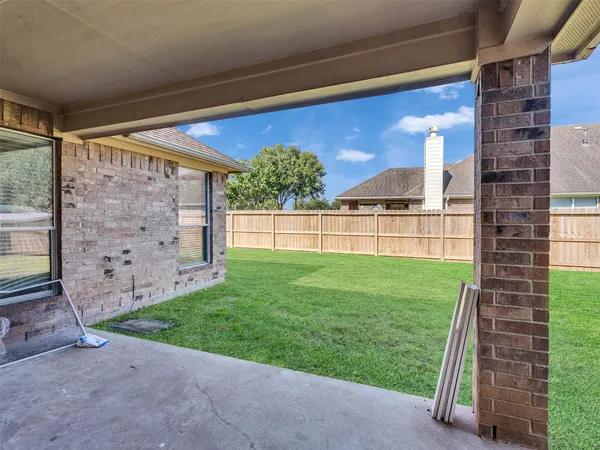 a view of a porch with a backyard
