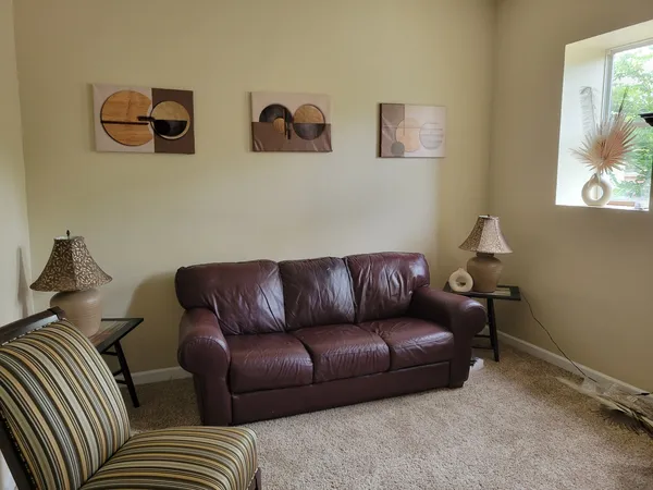 a living room with furniture and a couch