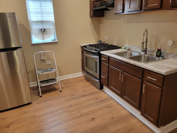 a bathroom with a tub and a shower