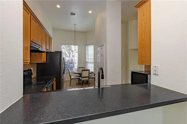 a view of a living room with furniture