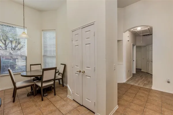 a view of a hallway with chairs