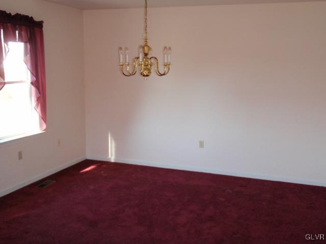 207 Stephanie Drive Easton, PA 18045 - Photo 8 of 15 an empty room with windows