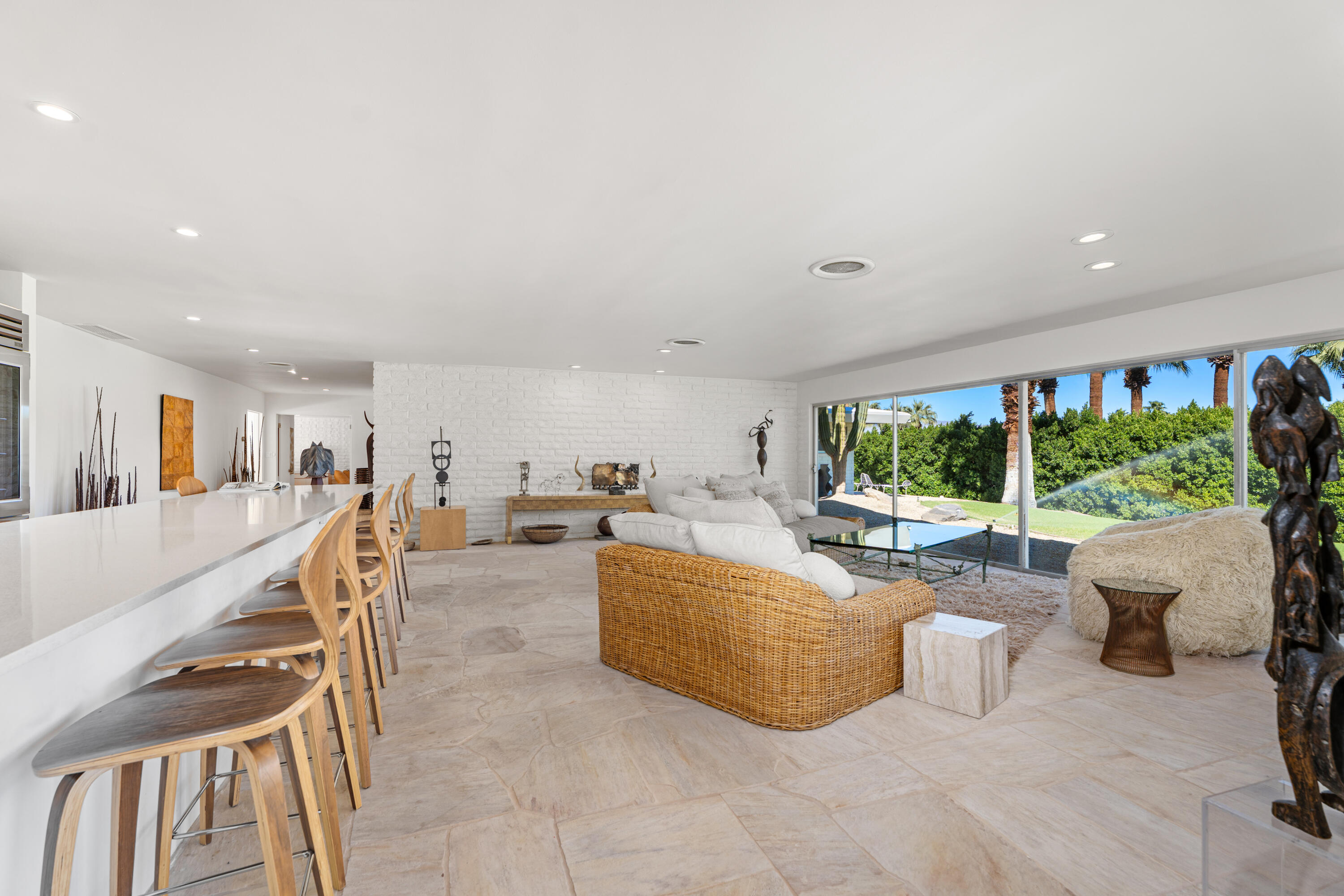 40286 Tonopah Road Rancho Mirage, CA 92270 - Photo 13 of 49 a living room with furniture and a large window