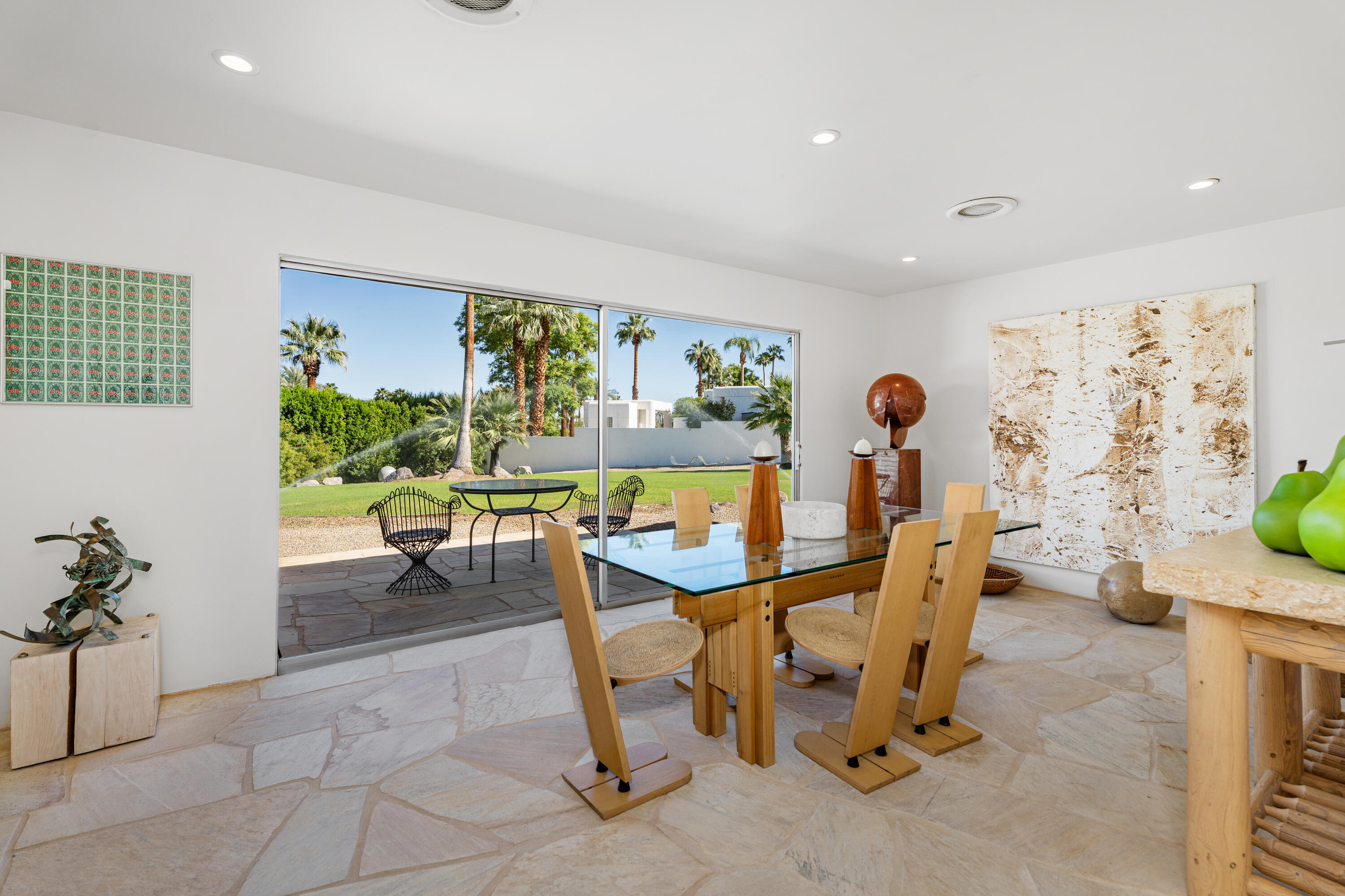 40286 Tonopah Road Rancho Mirage, CA 92270 - Photo 17 of 49 a view of a dining room with furniture window and outside view