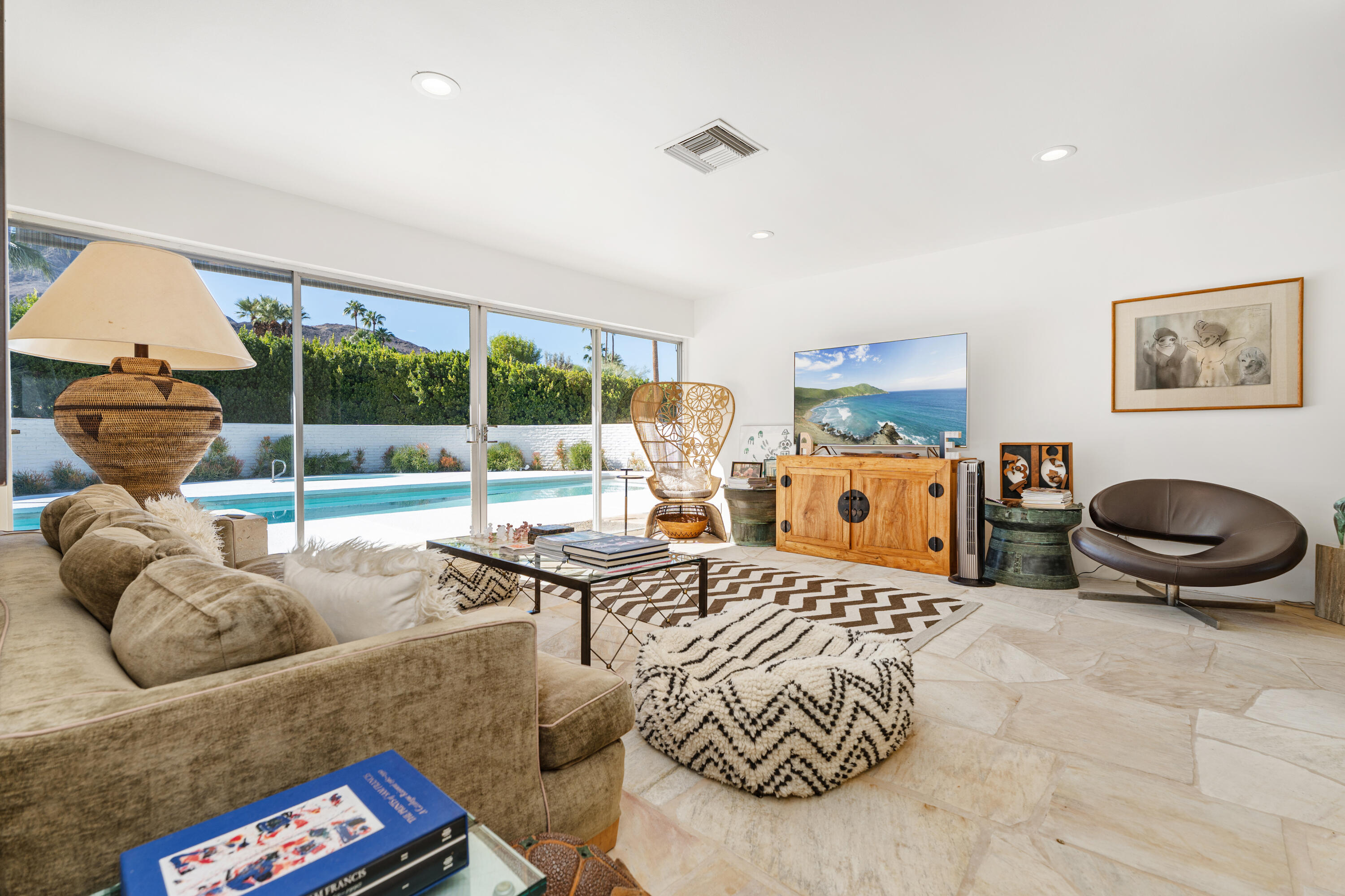 40286 Tonopah Road Rancho Mirage, CA 92270 - Photo 20 of 49 a living room with furniture and a large window