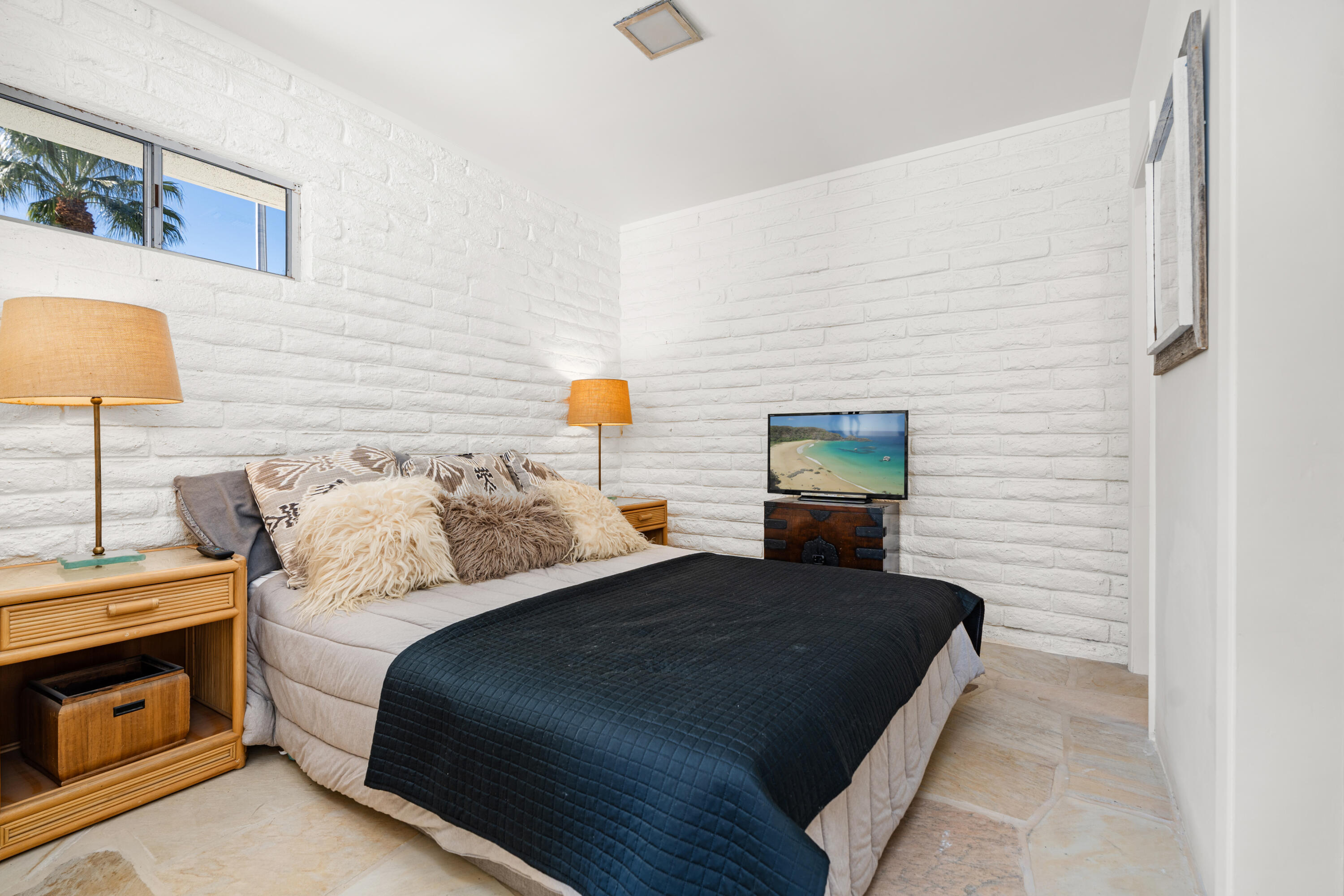 40286 Tonopah Road Rancho Mirage, CA 92270 - Photo 30 of 49 a bedroom with bed and window