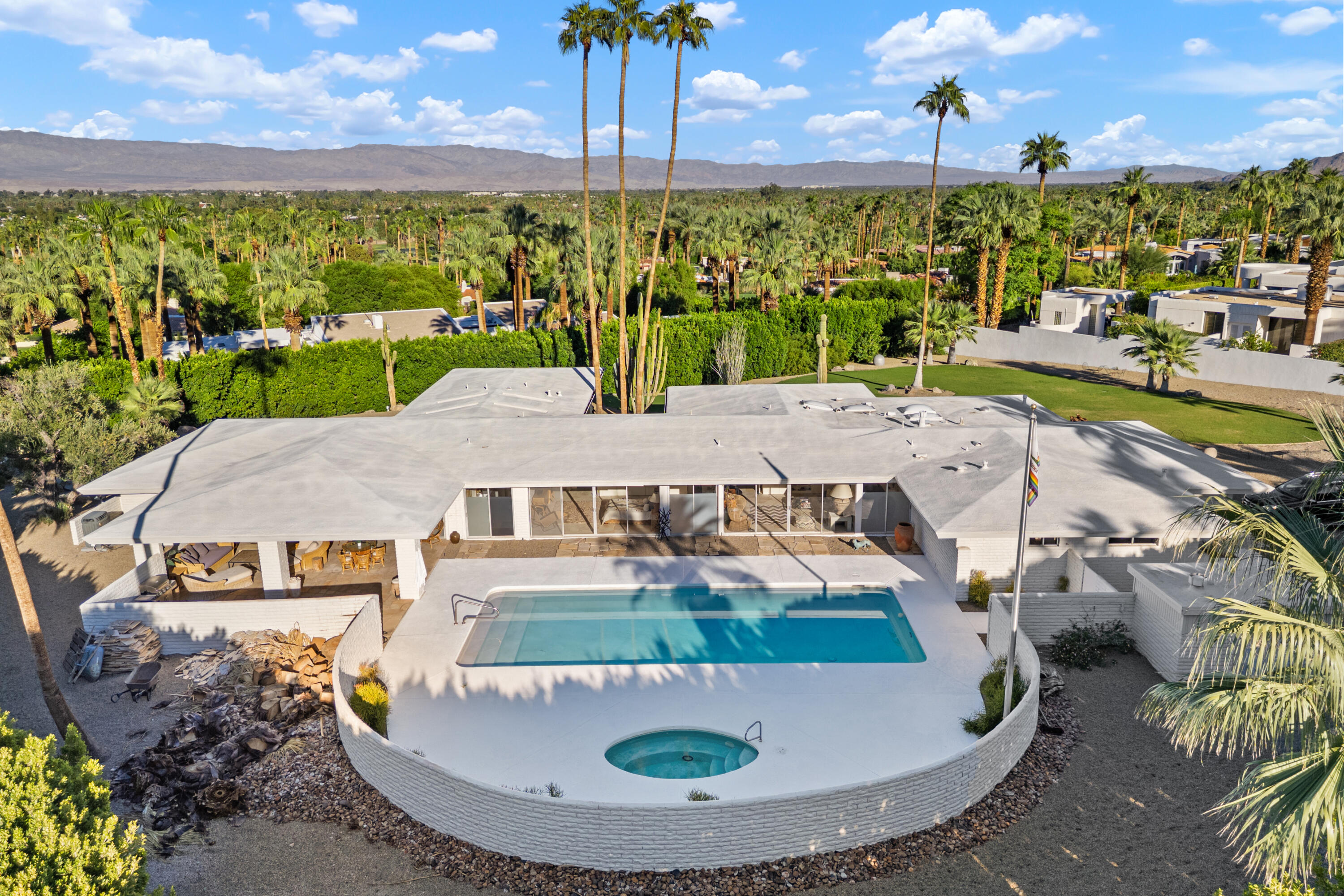 40286 Tonopah Road Rancho Mirage, CA 92270 - Photo 46 of 49 a view of a swimming pool with a patio