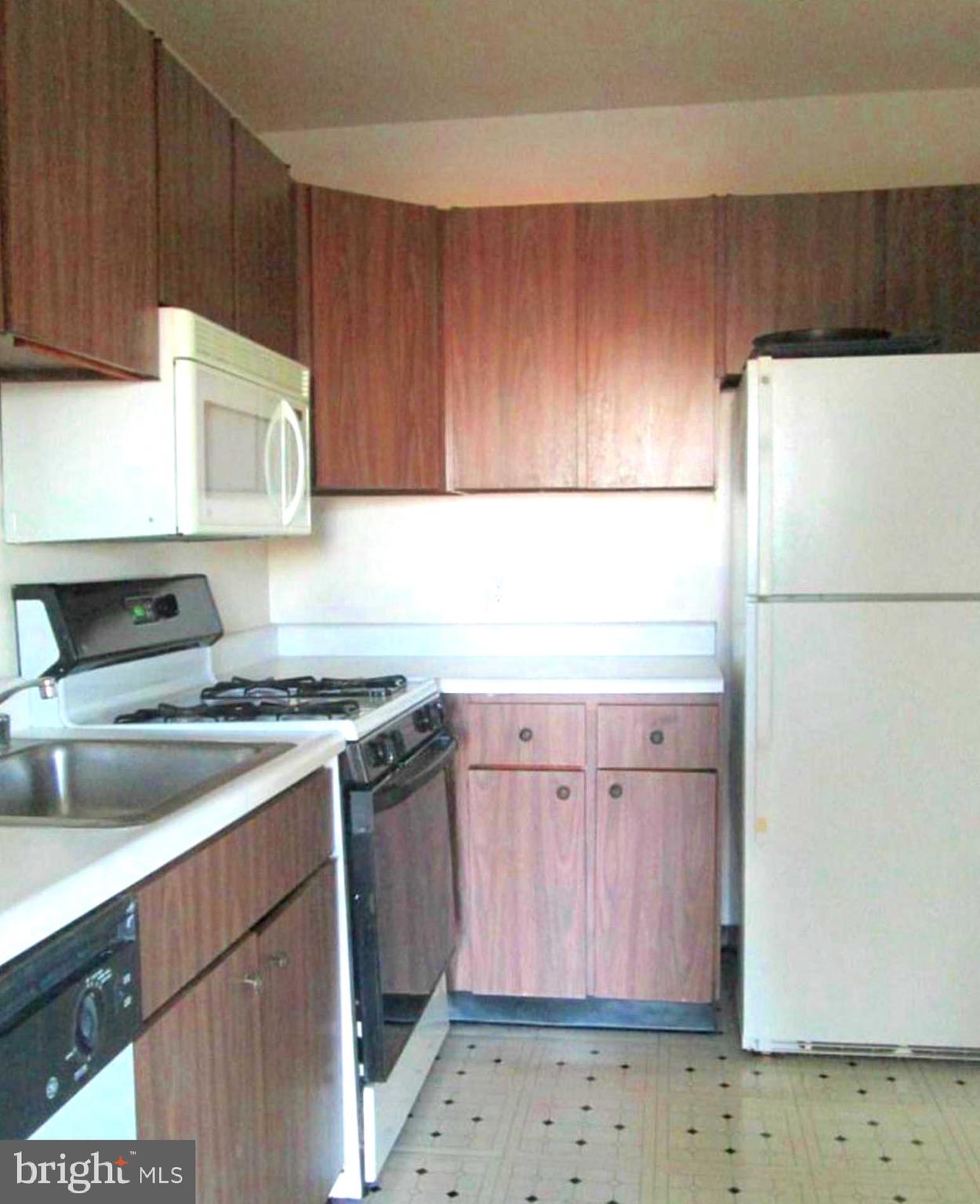 1111 University Boulevard West, Unit 1118A Silver Spring, MD 20902 - Photo 4 of 7 Kitchen 2