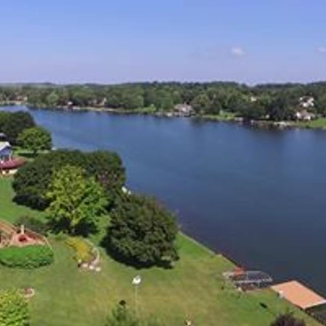 252 Lake Summerset Road Lake Summerset, IL 61019 - Photo 12 of 15 a view of a lake with a city