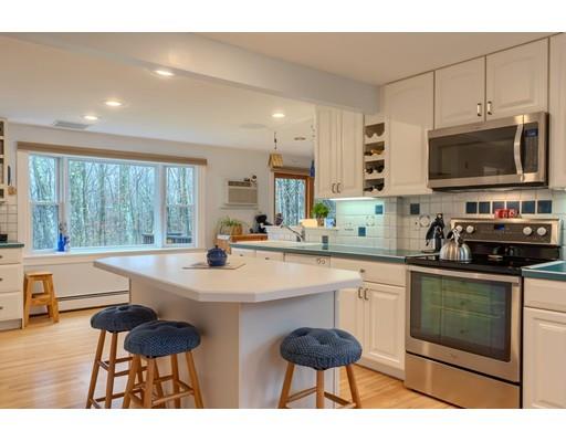 149 Beaman Road Princeton, MA 01541 - Photo 13 of 31 a kitchen with stainless steel appliances a stove a sink and a microwave