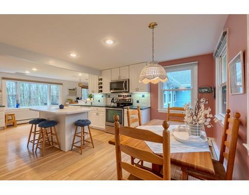 149 Beaman Road Princeton, MA 01541 - Photo 15 of 31 a dining room with furniture a kitchen view and chandelier