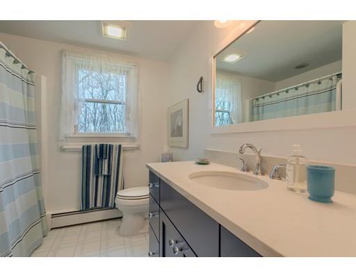 149 Beaman Road Princeton, MA 01541 - Photo 26 of 31 a bathroom with a sink a toilet and mirror
