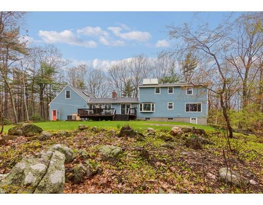 149 Beaman Road Princeton, MA 01541 - Photo 3 of 31 a large house with a big yard and large trees