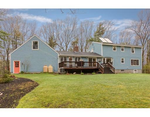 149 Beaman Road Princeton, MA 01541 - Photo 31 of 31 a view of a house with a yard and sitting area