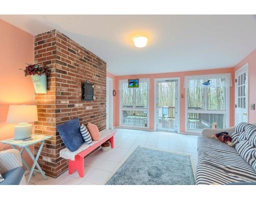 149 Beaman Road Princeton, MA 01541 - Photo 6 of 31 a living room with furniture and a floor to ceiling window