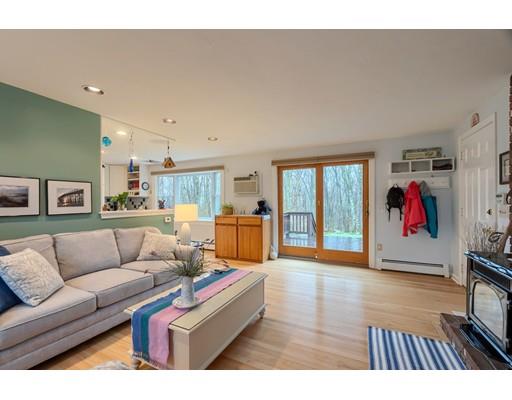 149 Beaman Road Princeton, MA 01541 - Photo 10 of 31 a living room with furniture and a flat screen tv