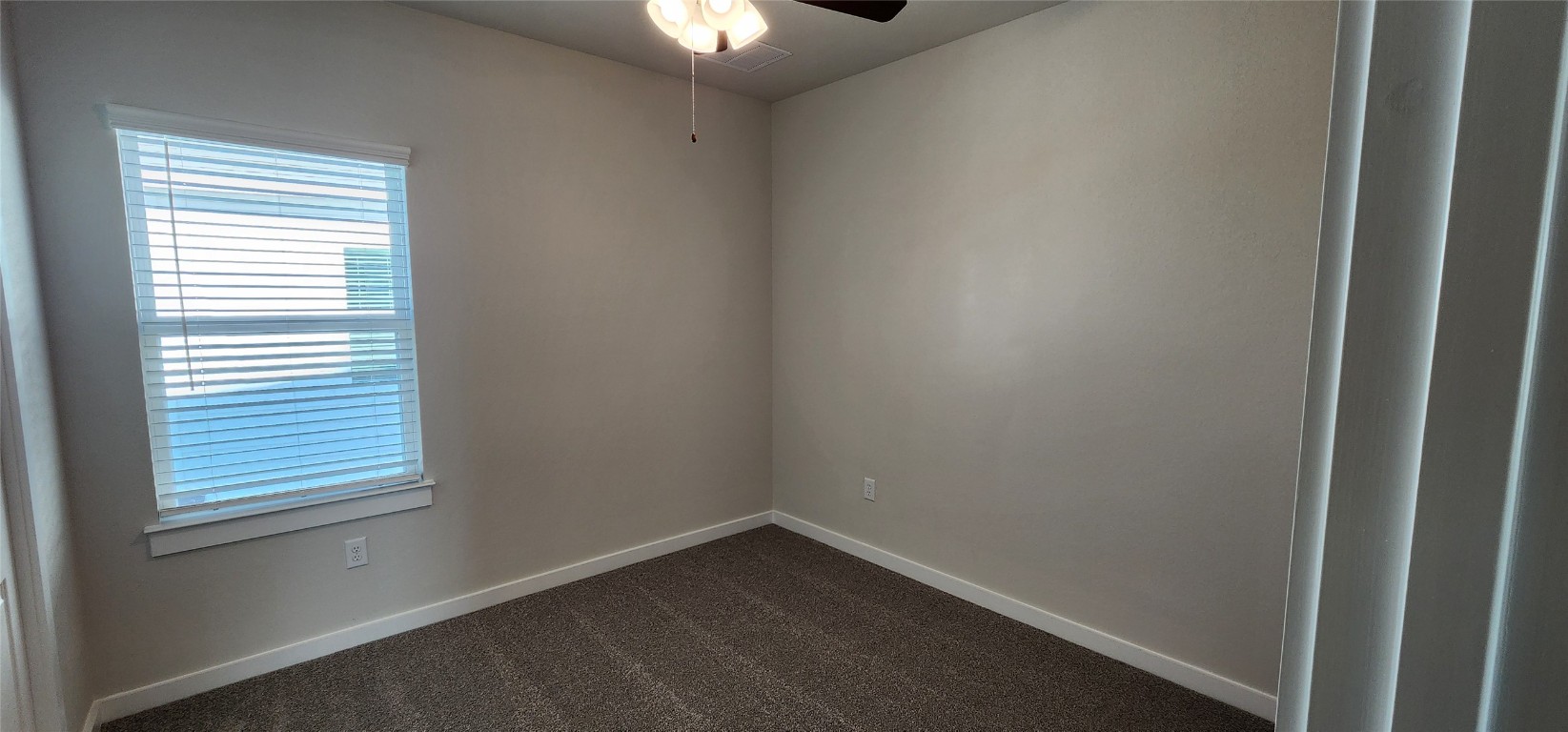 2232 Delano Drive Leander, TX 78641 - Photo 23 of 36 an empty room with a window