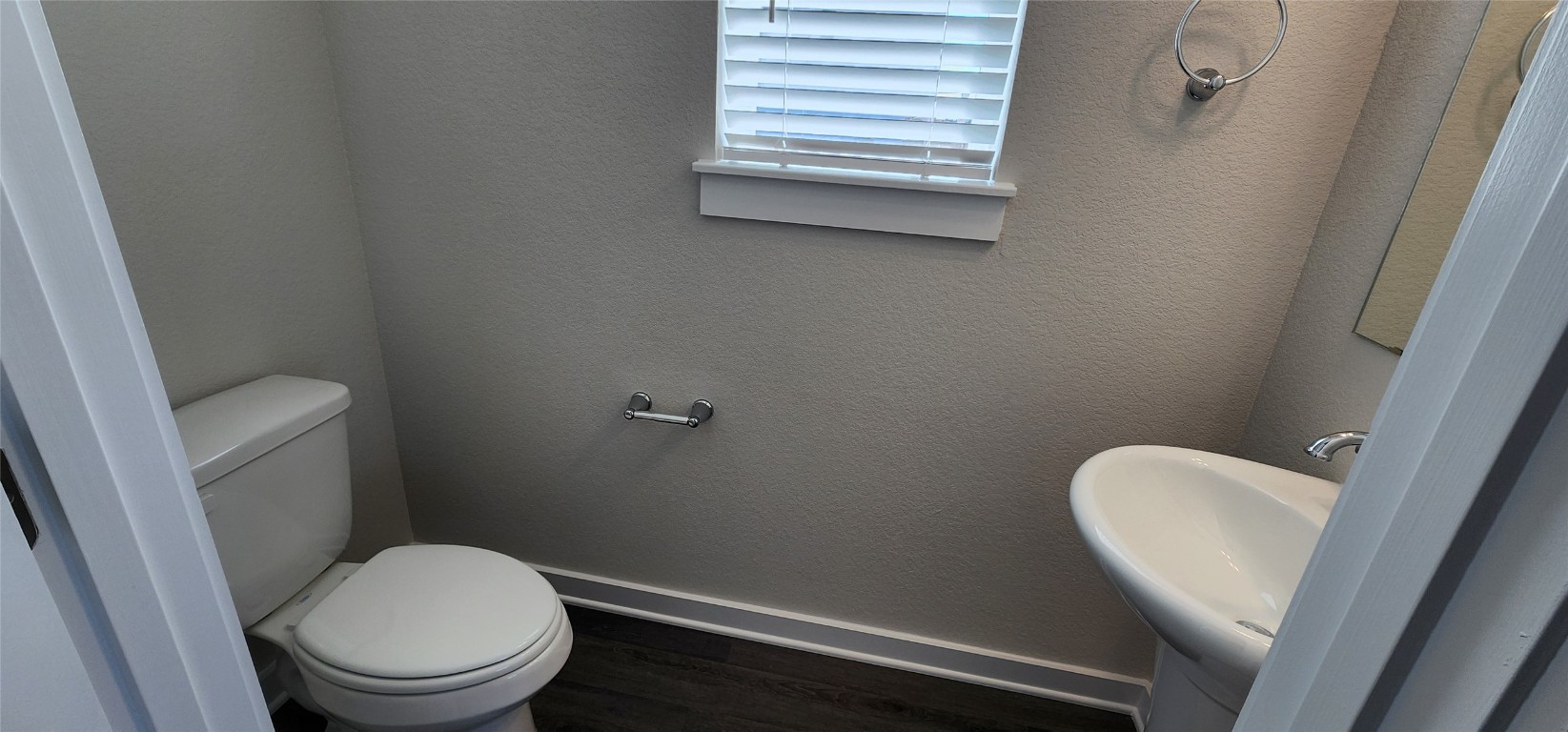 2232 Delano Drive Leander, TX 78641 - Photo 3 of 36 a white toilet sitting next to a window