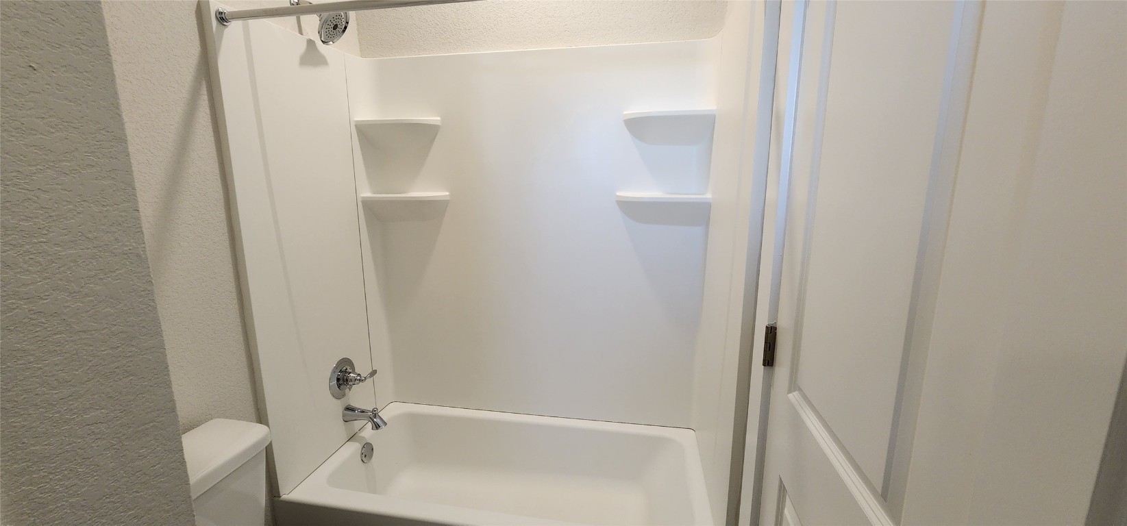 2232 Delano Drive Leander, TX 78641 - Photo 31 of 36 a bathroom with a bathtub