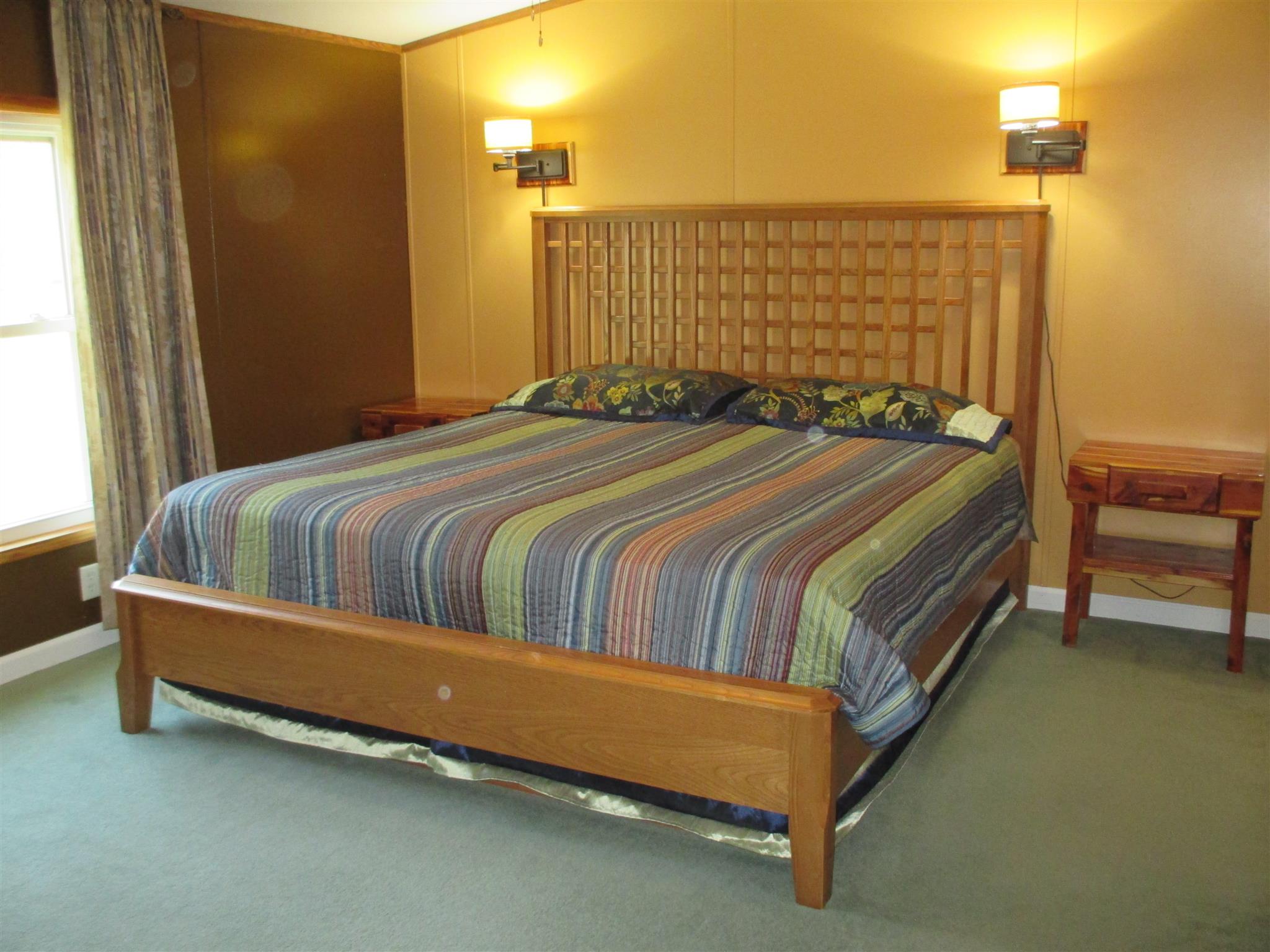 873 Prosser Road Leoma, TN 38468 - Photo 8 of 25 a bed sitting in a bedroom next to a window