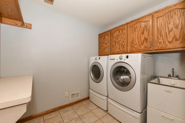 $580,500 | 5700 Woodland Hills Drive, Mount Pleasant, WI 53406