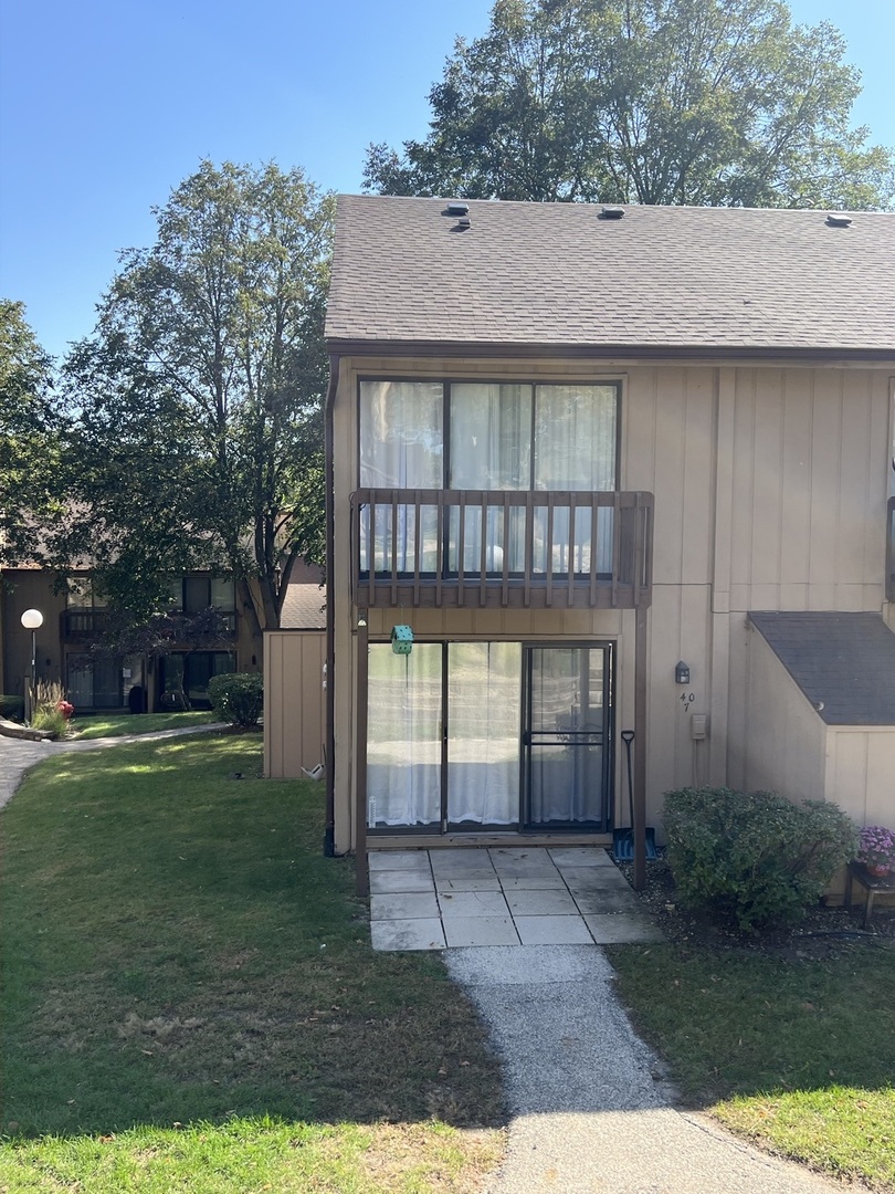 a view of a house with a garden