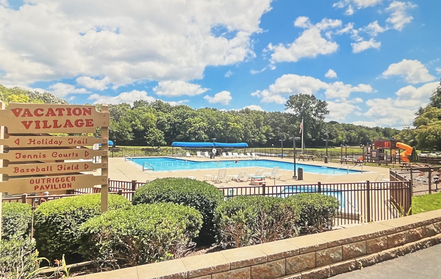 40 Bermuda Colony, Unit 7 Fox Lake, IL 60020 - Photo 11 of 20 a view of a swimming pool with a lawn chairs