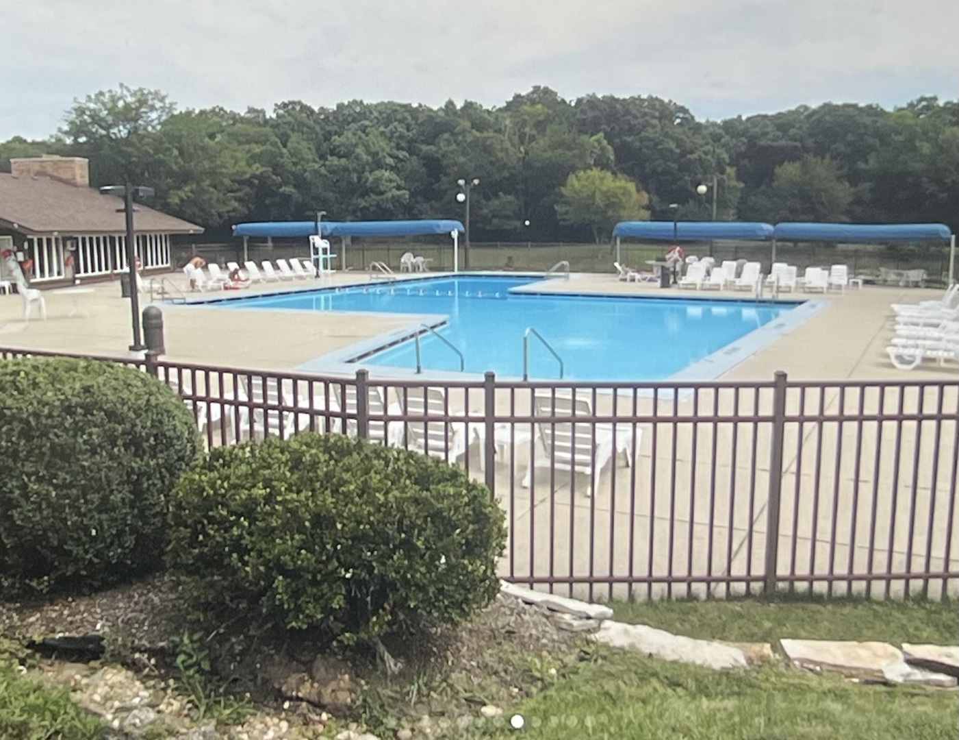 40 Bermuda Colony, Unit 7 Fox Lake, IL 60020 - Photo 13 of 20 a view of a swimming pool with a patio