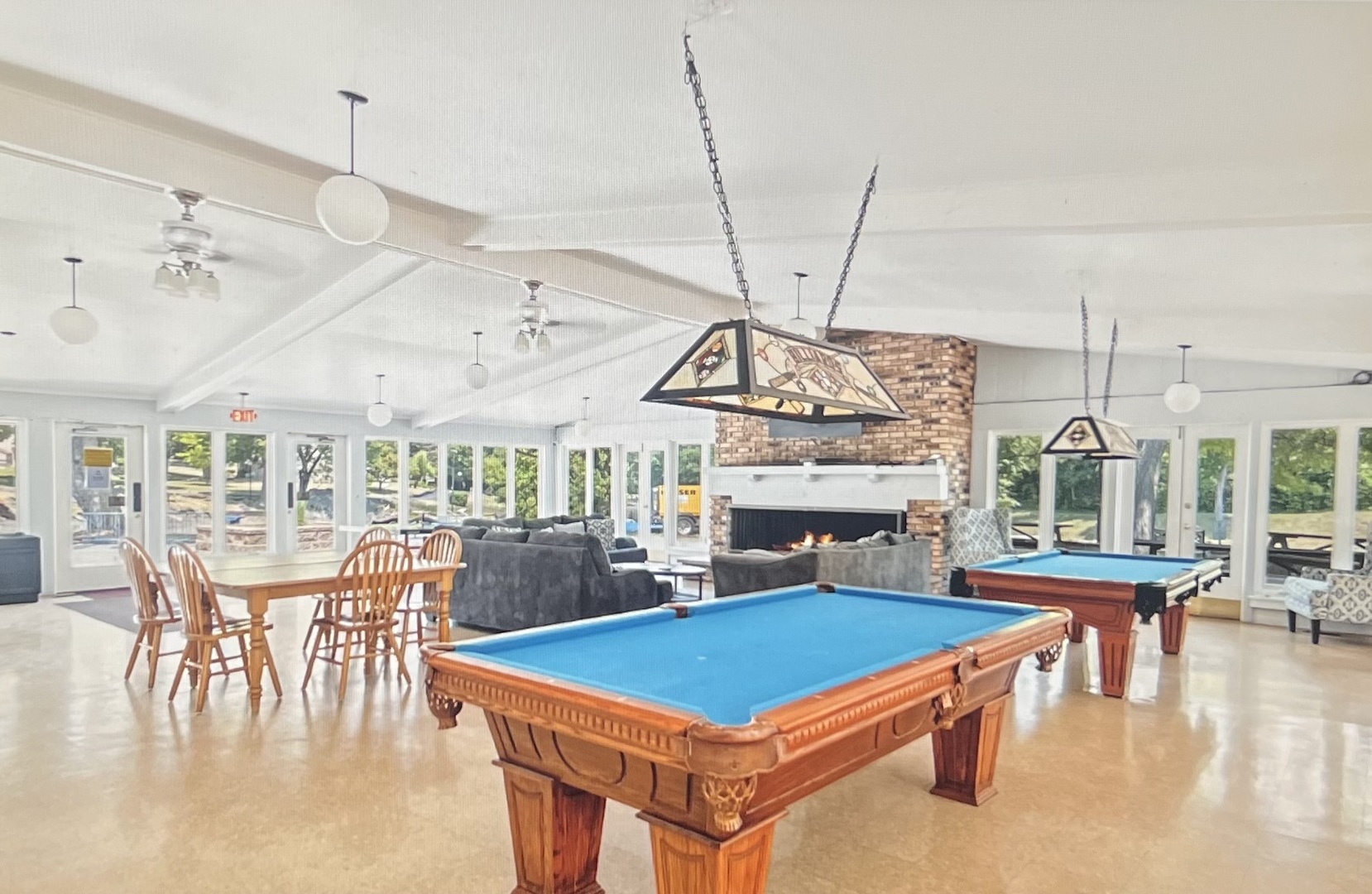 40 Bermuda Colony, Unit 7 Fox Lake, IL 60020 - Photo 15 of 20 a living room with lots of furniture and a chandelier