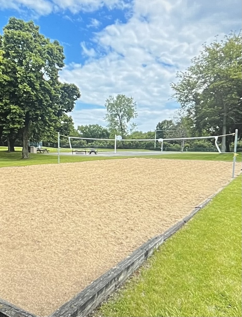 40 Bermuda Colony, Unit 7 Fox Lake, IL 60020 - Photo 18 of 20 a view of a lake with a big yard