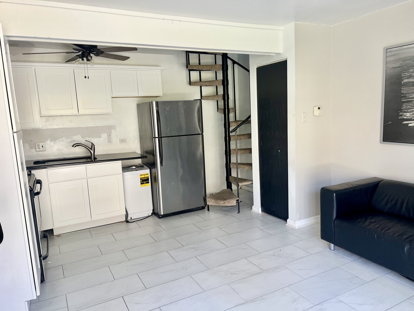 40 Bermuda Colony, Unit 7 Fox Lake, IL 60020 - Photo 2 of 20 a utility room with cabinets washer and dryer