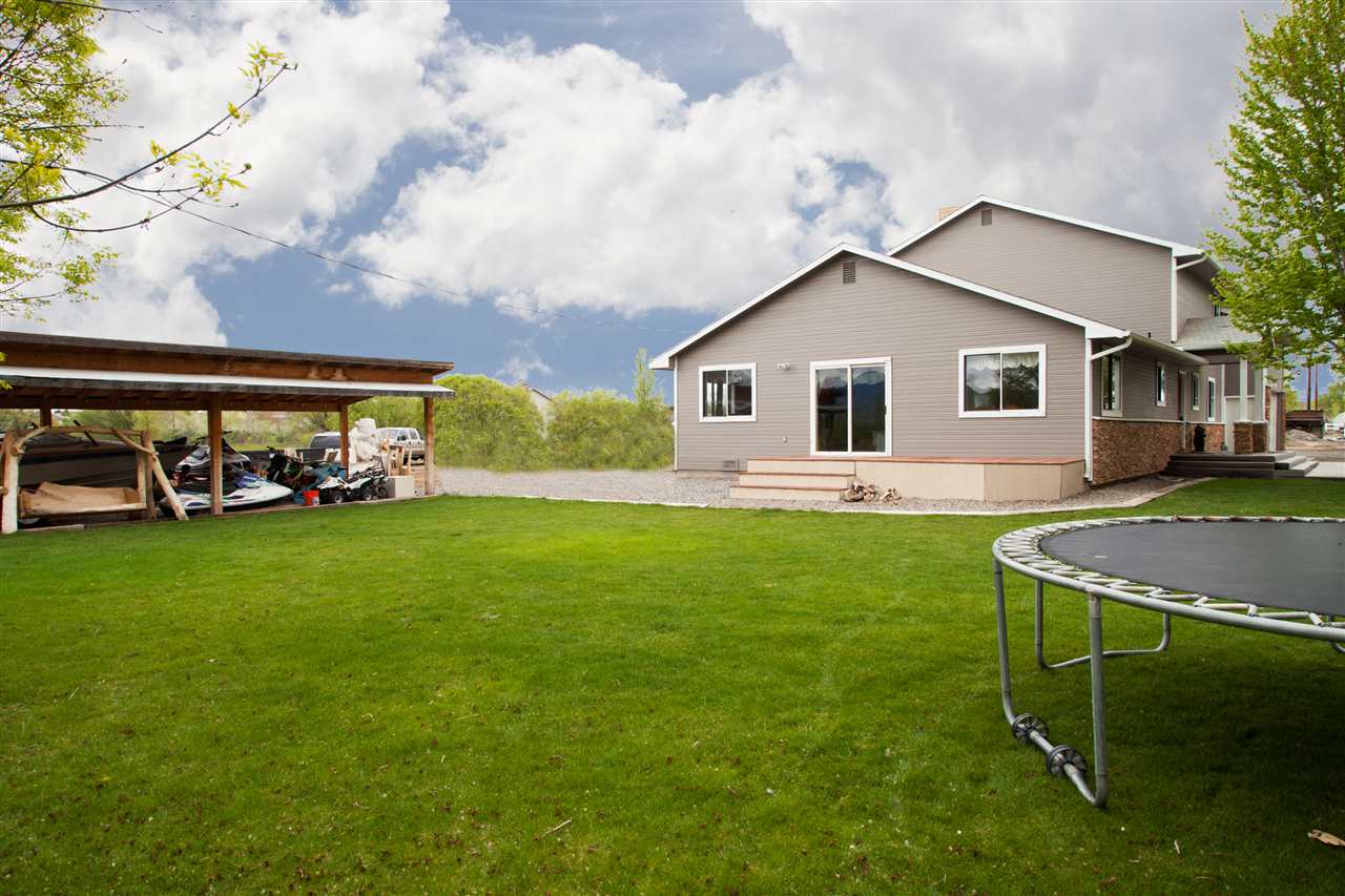 577 29 Road Grand Junction, CO 81501 - Photo 15 of 17 a front view of house with yard and green space