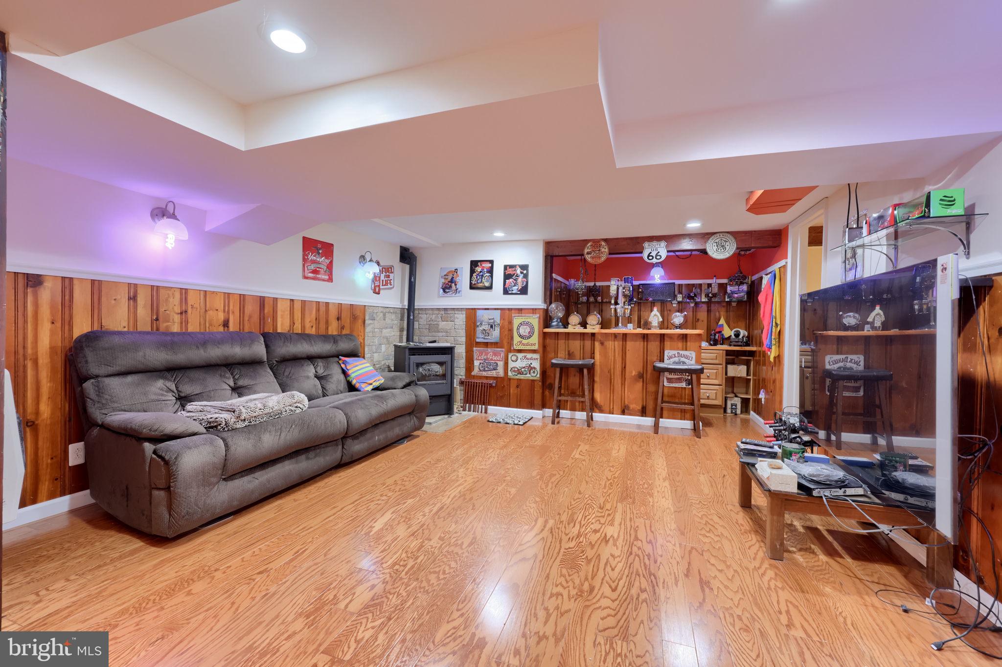 355 Harry Road Coatesville, PA 19320 - Photo 38 of 48 Cozy basement retreat with rustic charm.