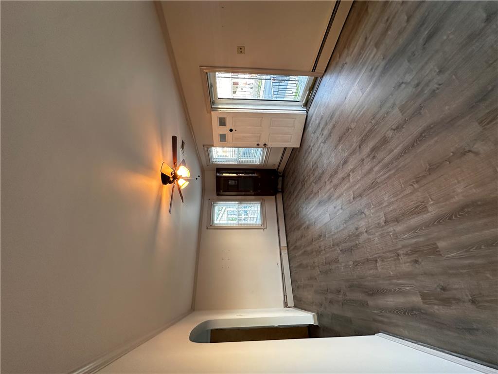 5128 3rd Street Whitehall, PA 18052 - Photo 12 of 26 Natural light illuminates new flooring in this welcoming entry.