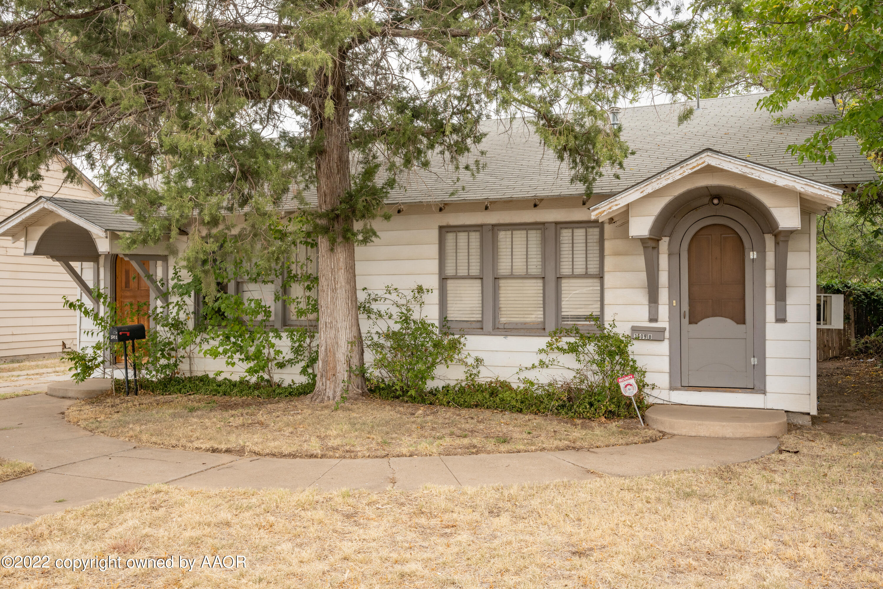 3609 South Tyler Street Amarillo, TX 79110 - Photo 3 of 25 a front view of a house with garden